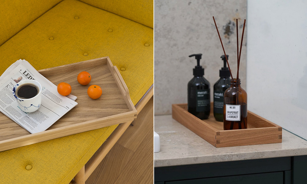 Hochwertige Serviertabletts aus Eichenholz von Kath Andersen – vielseitig einsetzbar als Frühstückstablett mit Kaffee, Obst und Zeitung oder als stilvolle Ablage für Bad-Accessoires und Düfte. Die minimalistischen Holz-Tabletts vereinen skandinavisches Design mit Funktionalität und passen perfekt in Küche, Wohnzimmer und Badezimmer.