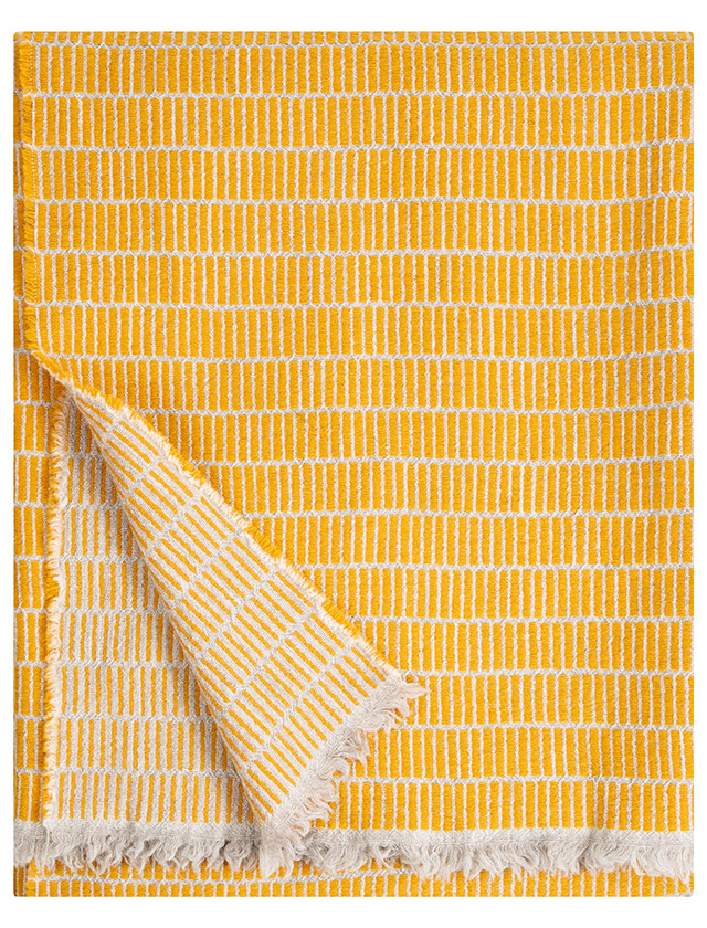Raitti Tagesdecke in Coffee Dyed Orange von Lapuan Kankurit.
